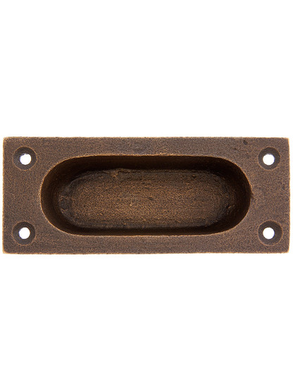 Cast Brass Flush Mount Sash Lift With Oval Inset In Weathered Bronze.